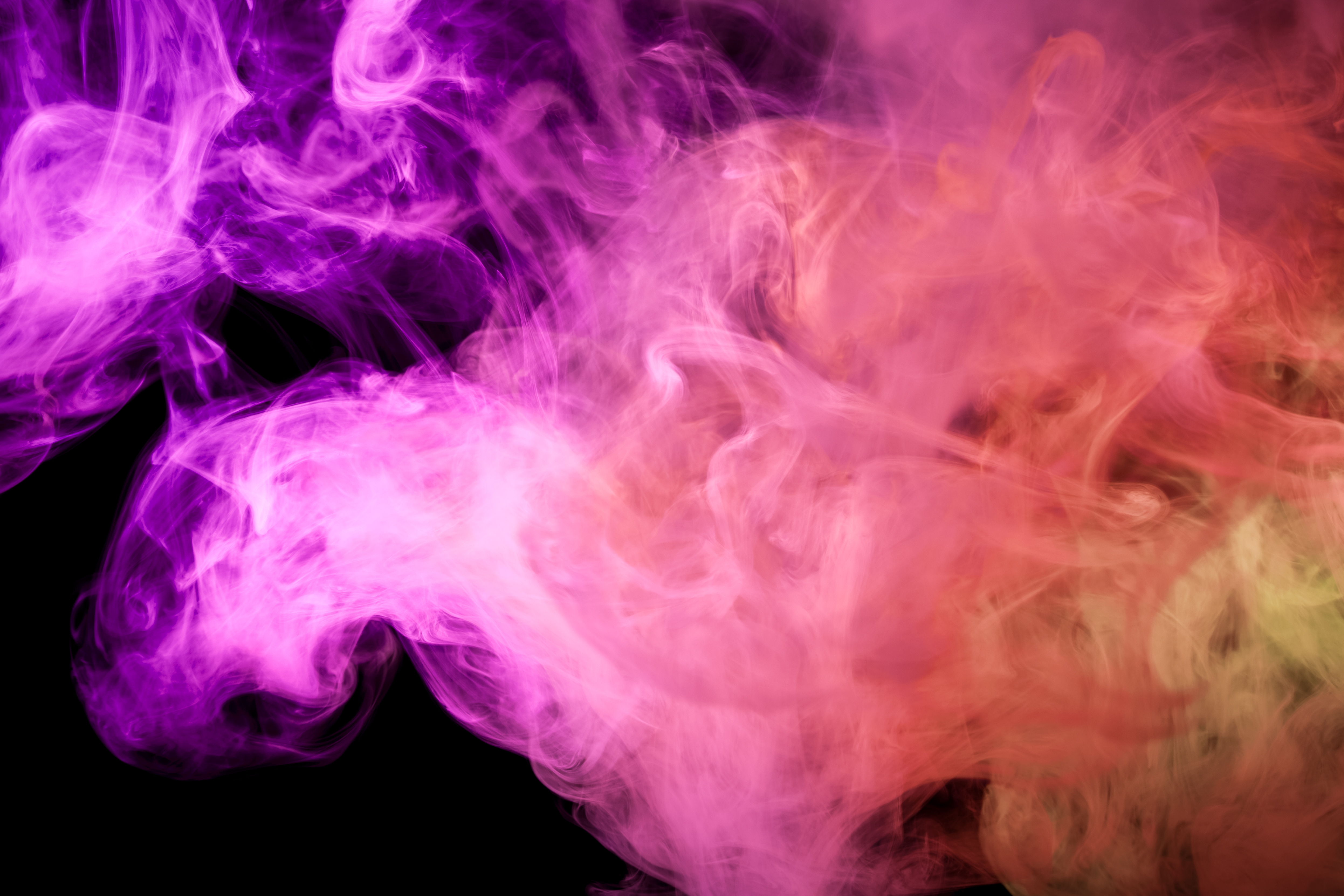 Purple, Pink, and Orange Smoke on Black Background